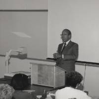 Richard Devos talking to a classroom of students.